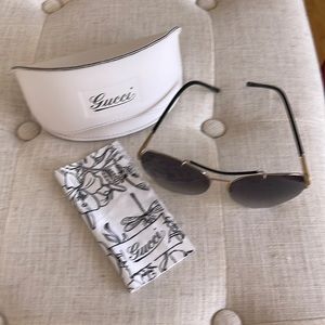 Beautiful Gucci black and gold sunglasses for women!